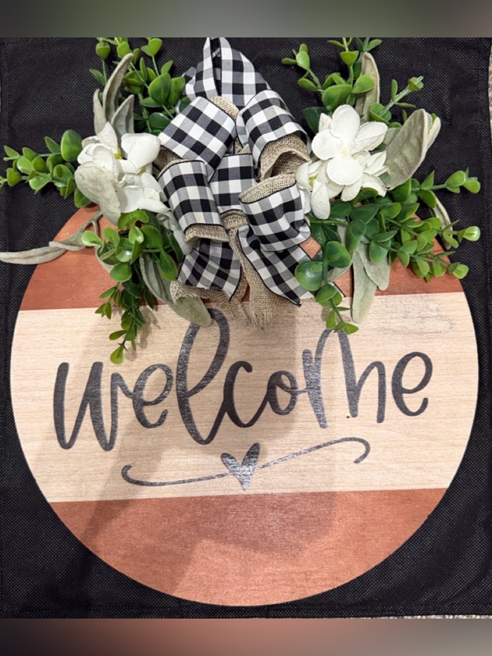 Farmhouse rustic wooden door sign with black-&-white bow & floral - gently used